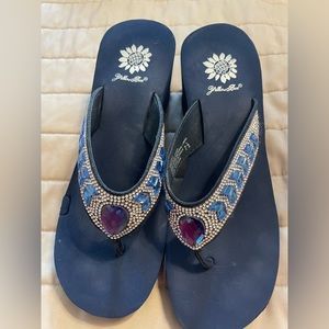 Navy Yellow Box flip flops. Size 7.5 women’s. Lots of sparkle detail.
